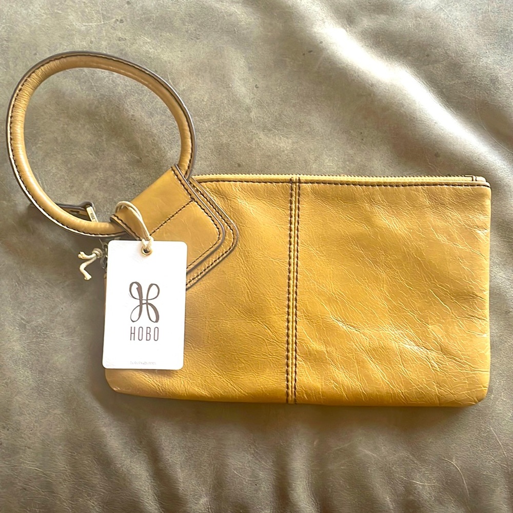Hobo brand wristlet. Color Cedar